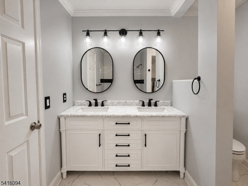 91 Delaware Lane, Unit 91 Somerville, NJ 08876 - Photo 25 of 32 a bathroom with a granite countertop double vanity sink