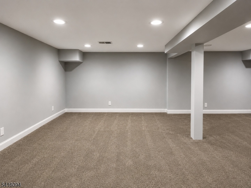 91 Delaware Lane, Unit 91 Somerville, NJ 08876 - Photo 27 of 32 an empty room with a natural light