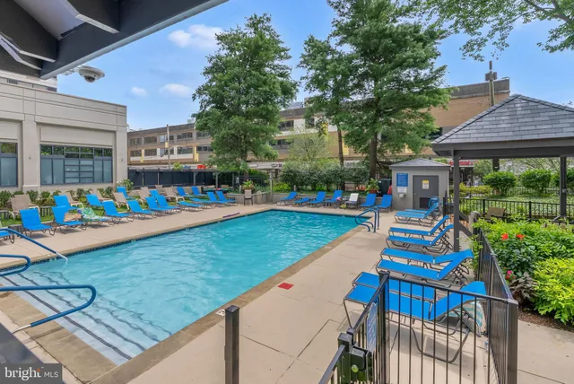 a patio view with a table and chairs