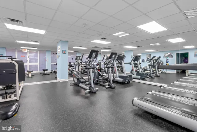 a room with furniture and a book shelf