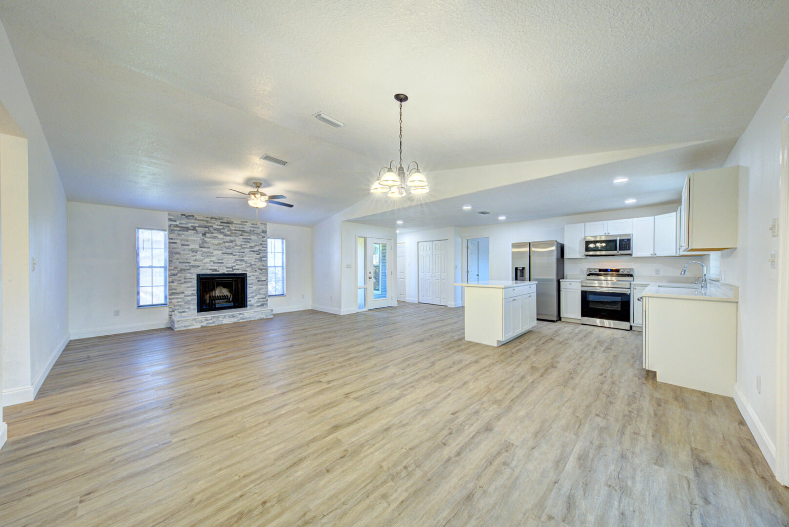 5360 Bridge Road Cocoa, FL 32927 - Photo 8 of 22 dining room open to living room & kitche