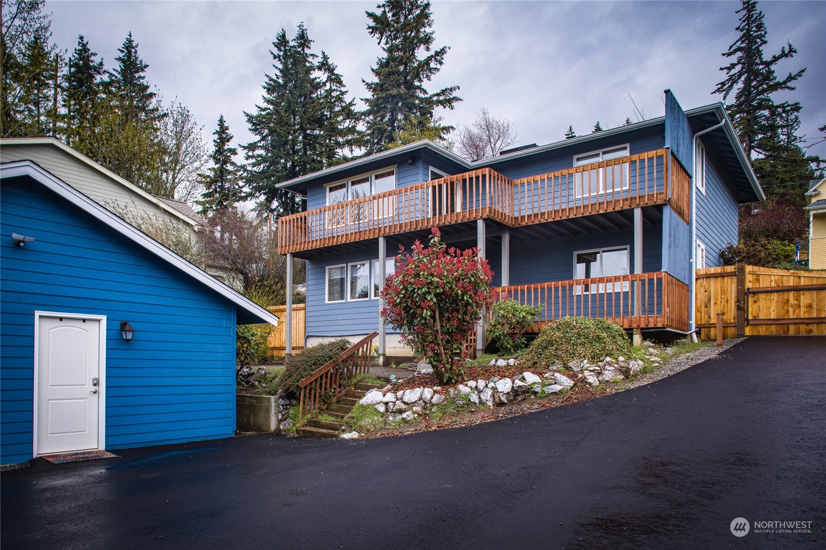 1818 35th Street Bellingham, WA 98229 - Photo 1 of 39 a front view of a house with garden