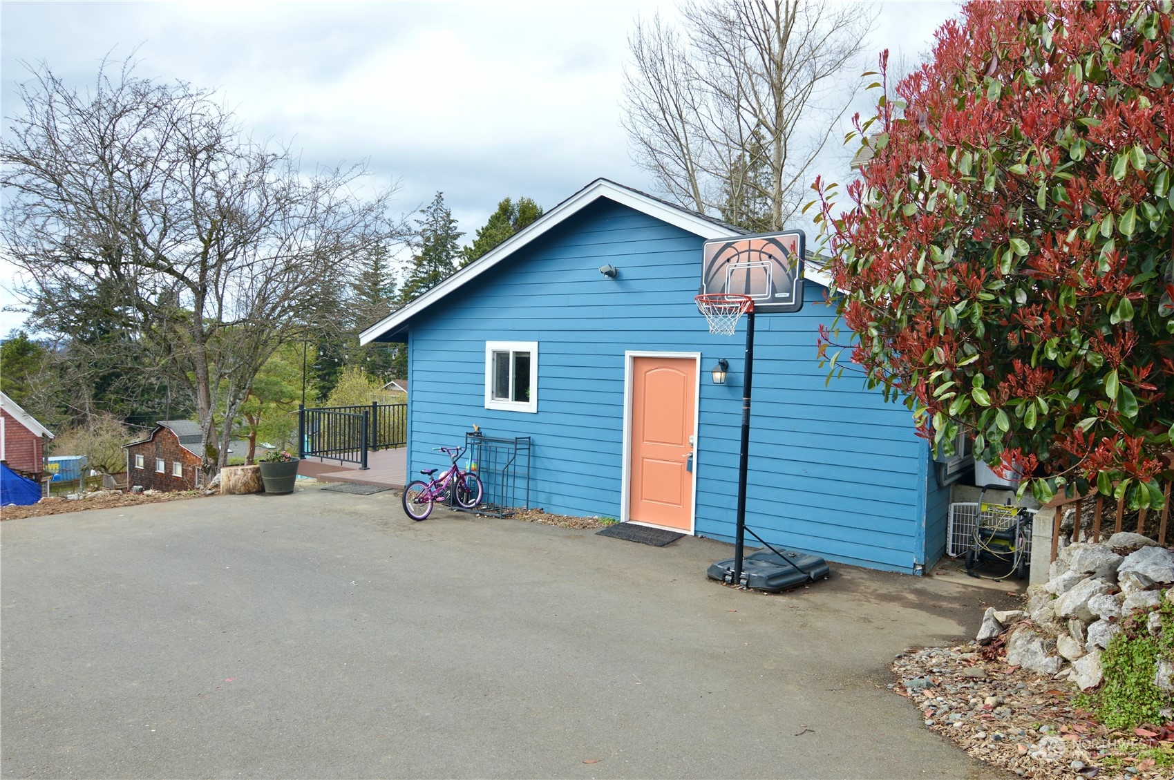 1818 35th Street Bellingham, WA 98229 - Photo 16 of 39 a view of a house with a patio and backyard