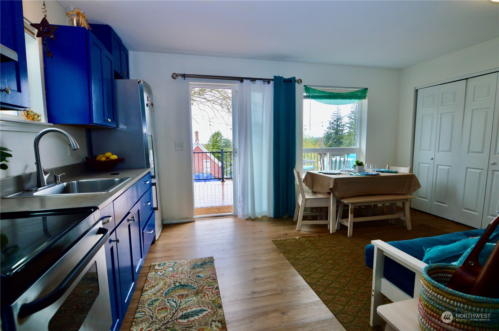 1818 35th Street Bellingham, WA 98229 - Photo 19 of 39 a kitchen with a wooden cabinets and a stove top oven