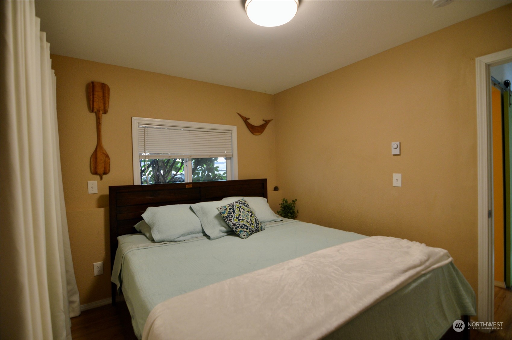 1818 35th Street Bellingham, WA 98229 - Photo 22 of 39 a bedroom with a bed and a window