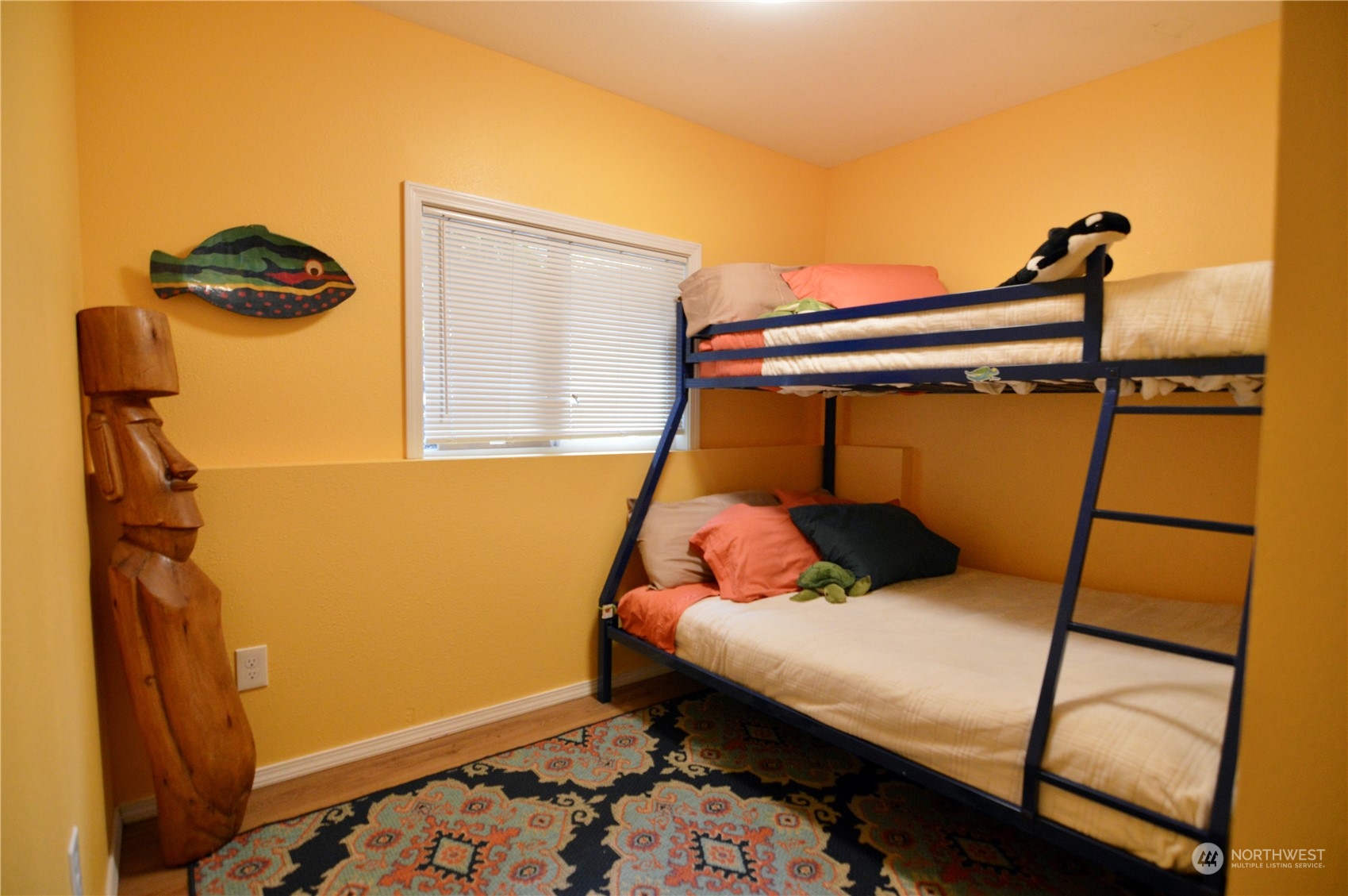1818 35th Street Bellingham, WA 98229 - Photo 23 of 39 a bedroom with a bed and a window