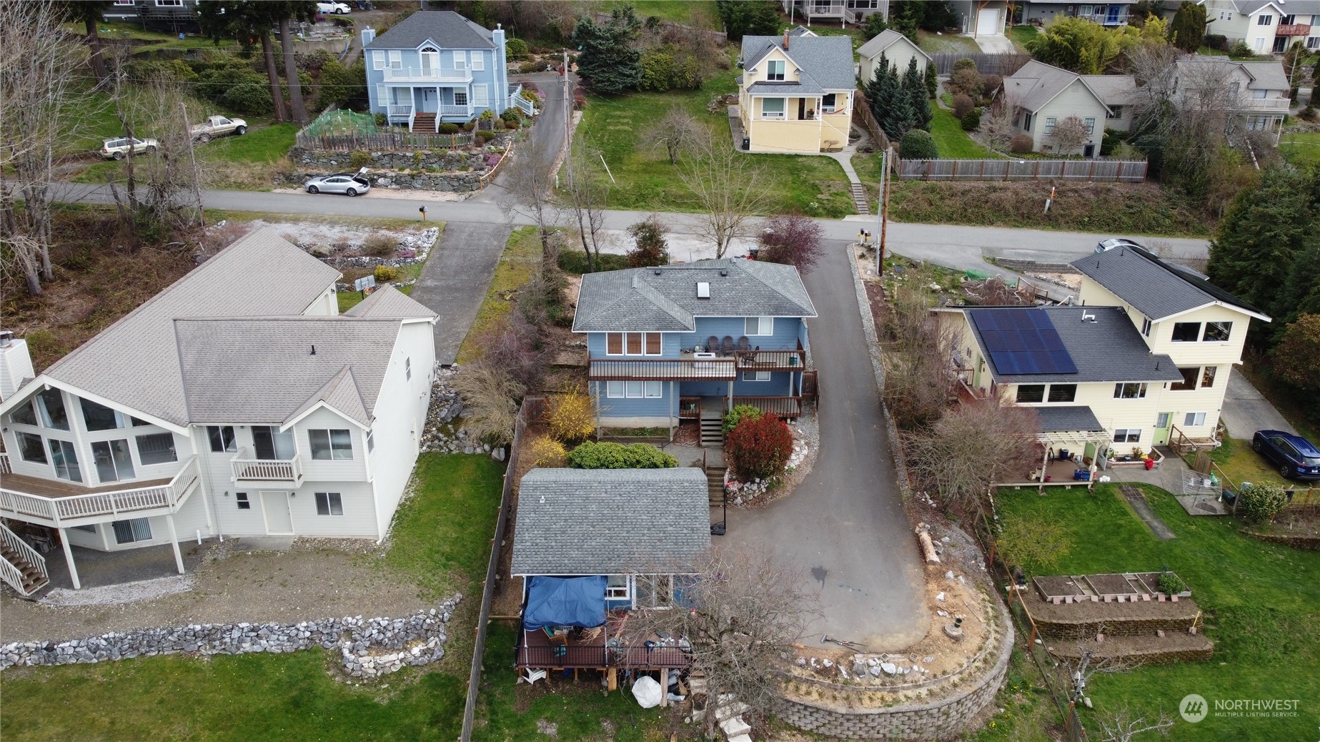 1818 35th Street Bellingham, WA 98229 - Photo 28 of 39 an aerial view of multiple houses with yard
