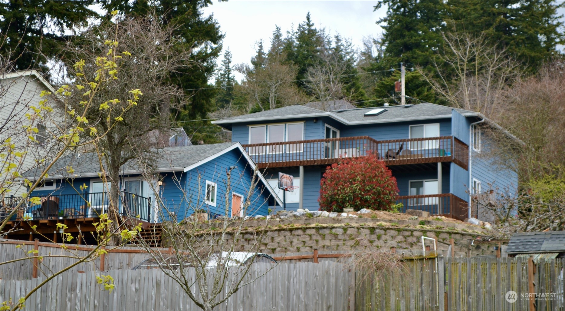 1818 35th Street Bellingham, WA 98229 - Photo 3 of 39 a front view of a house with a garden