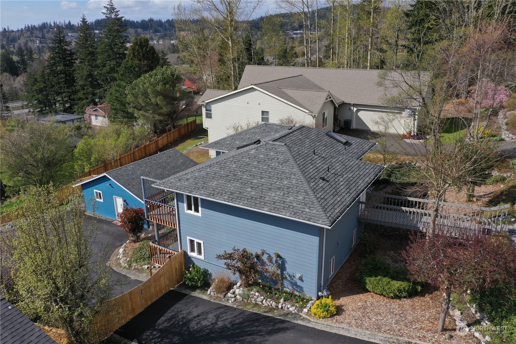 1818 35th Street Bellingham, WA 98229 - Photo 35 of 39 an aerial view of a house with garden space and sitting area