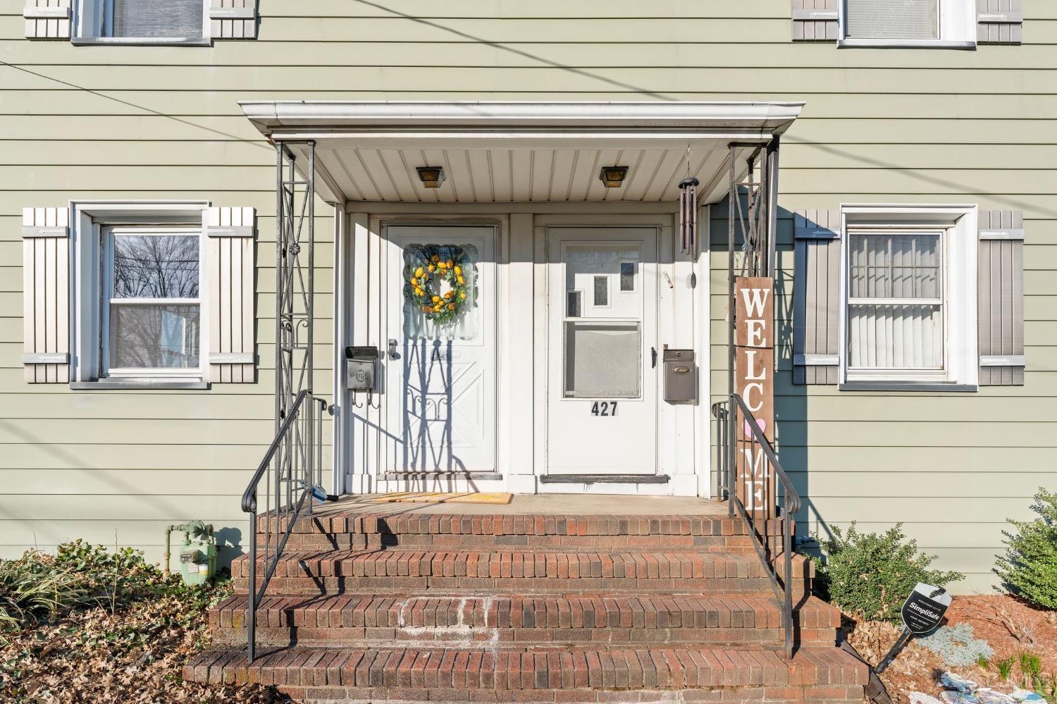 425 Crows Mill Road Fords, NJ 08863 - Photo 2 of 16 a front view of a house with a porch