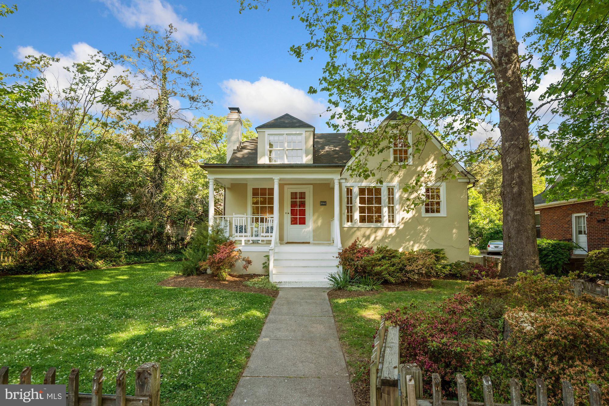 3707 Spring Street Chevy Chase, MD 20815 - Photo 1 of 25 a front view of a house with garden