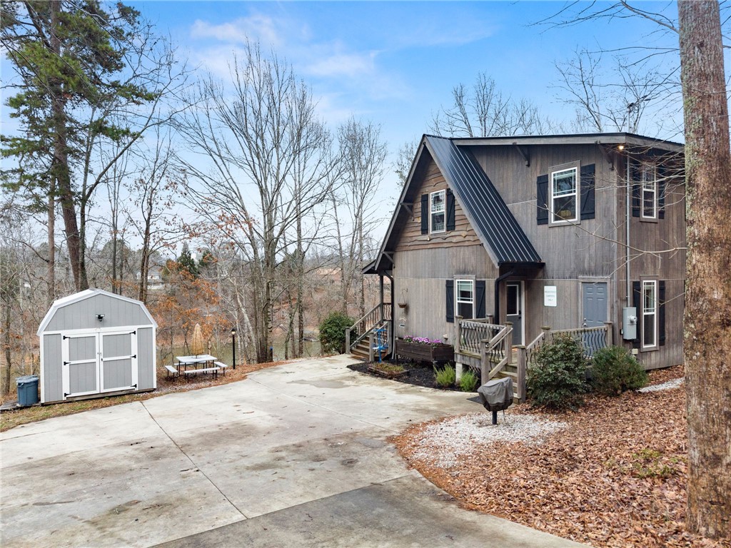 97 Cherokee Road Toccoa, GA 30577 - Photo 1 of 30 This captivating residence boasts rustic charm and serene natural surroundings.