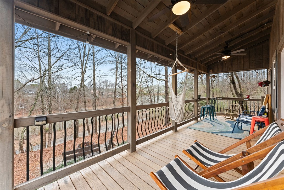 97 Cherokee Road Toccoa, GA 30577 - Photo 22 of 30 An inviting porch with wooden floors and a scenic outdoor view awaits you.