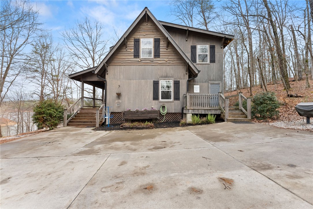 97 Cherokee Road Toccoa, GA 30577 - Photo 5 of 30 This charming home features a lovely exterior, perfect for enjoying the peaceful natural surroundings.
