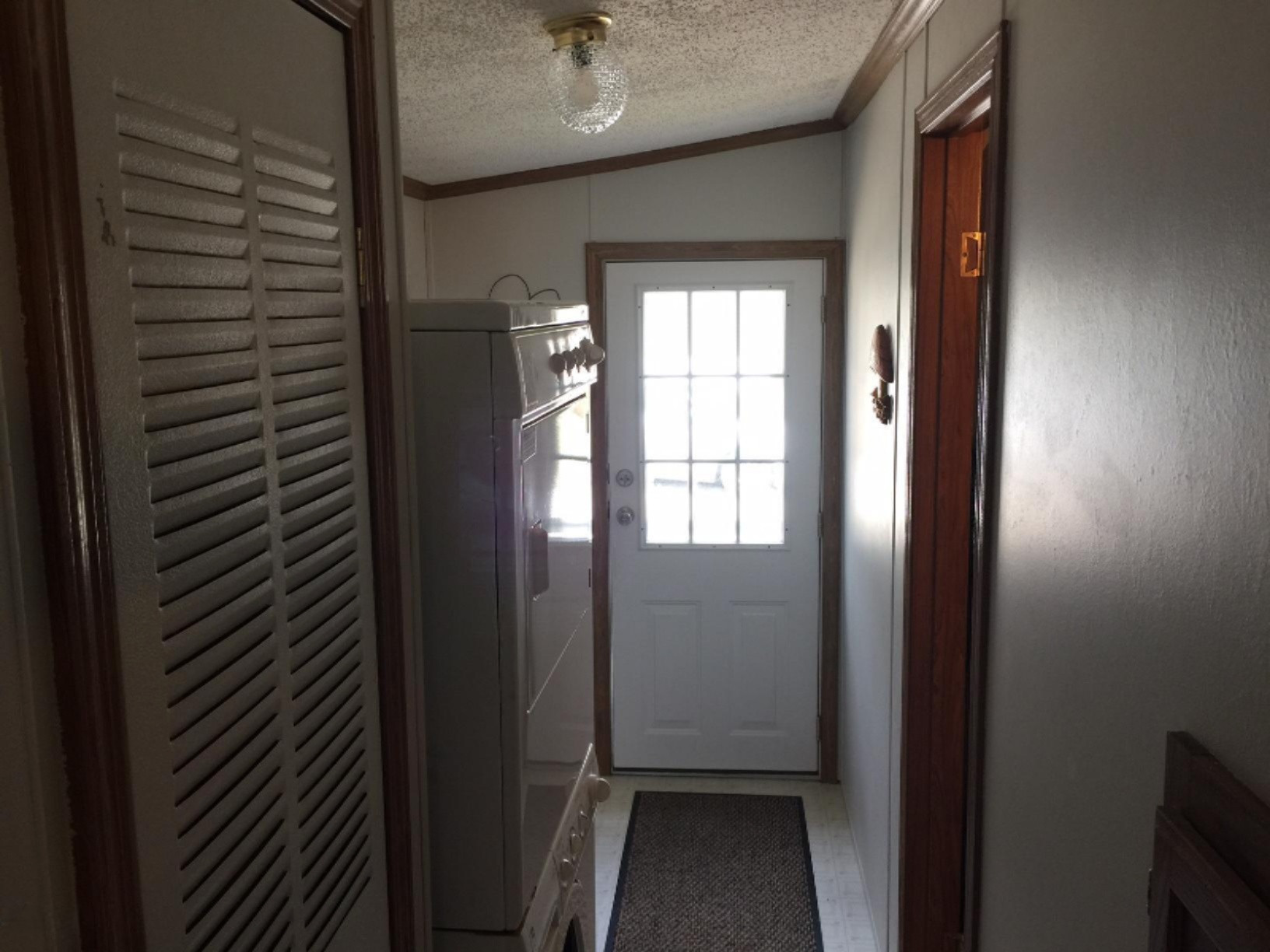 8924 East Roosevelt Road Holton, MI 49425 - Photo 11 of 14 Entryway into Laundry Area