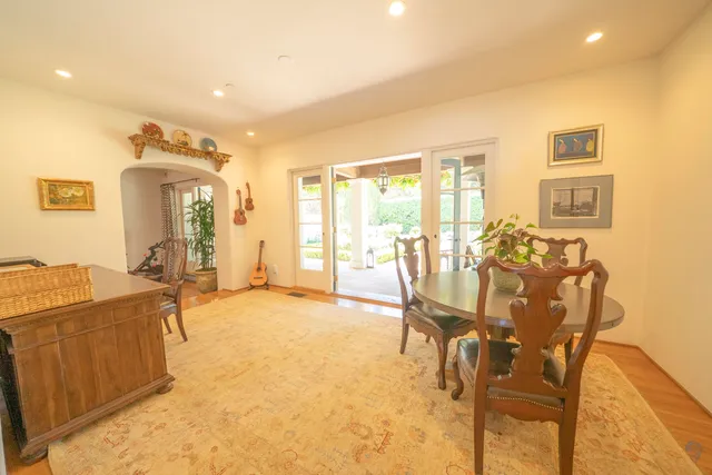 a view of a livingroom with furniture and a window