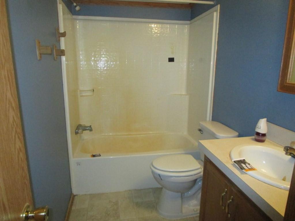 416 Plum Sock Road Prosperity, PA 15329 - Photo 11 of 22 a bathroom with a sink toilet and shower