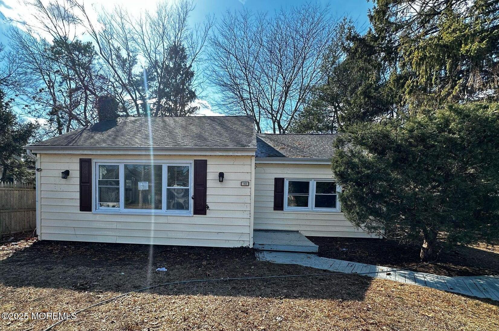 112 Pinehurst Road Brick, NJ 08723 - Photo 14 of 14 a front view of a house with garden