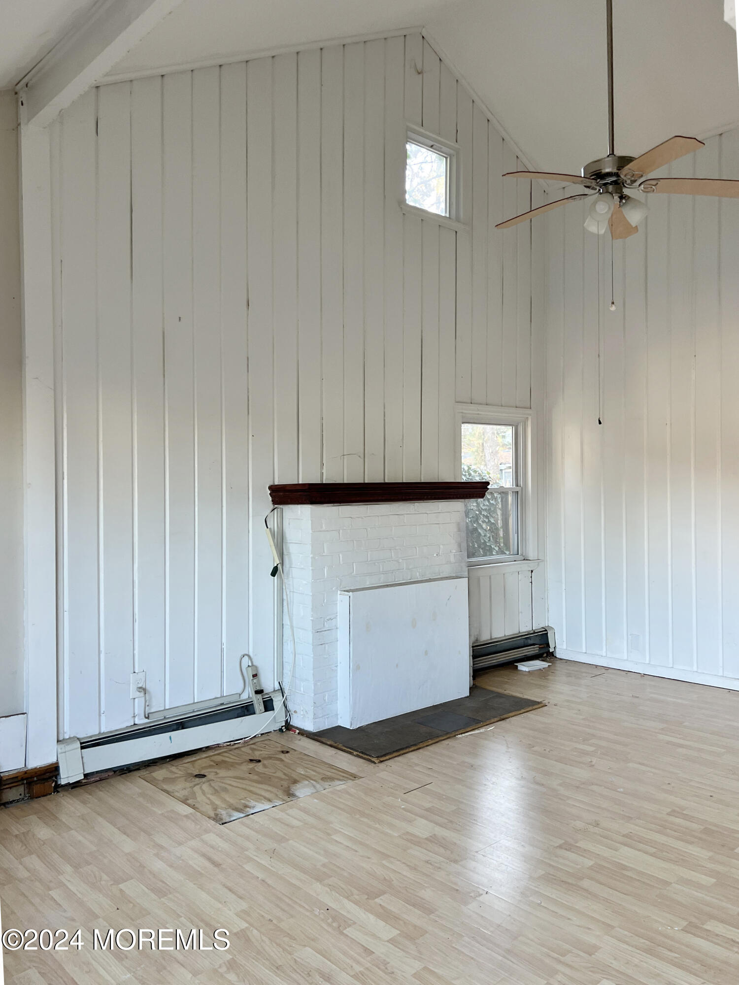 112 Pinehurst Road Brick, NJ 08723 - Photo 2 of 14 a view of an empty room with wooden floor