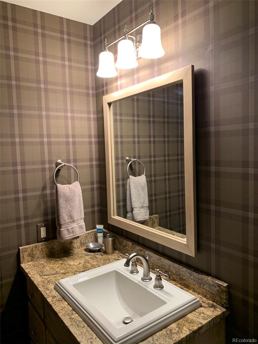 5148 Gore Circle Vail, CO 81657 - Photo 19 of 22 a bathroom with a sink and a mirror