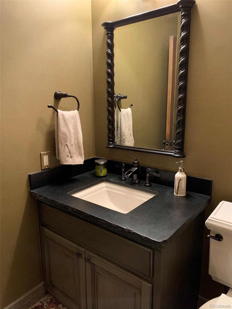 5148 Gore Circle Vail, CO 81657 - Photo 8 of 22 a bathroom with a sink and a mirror