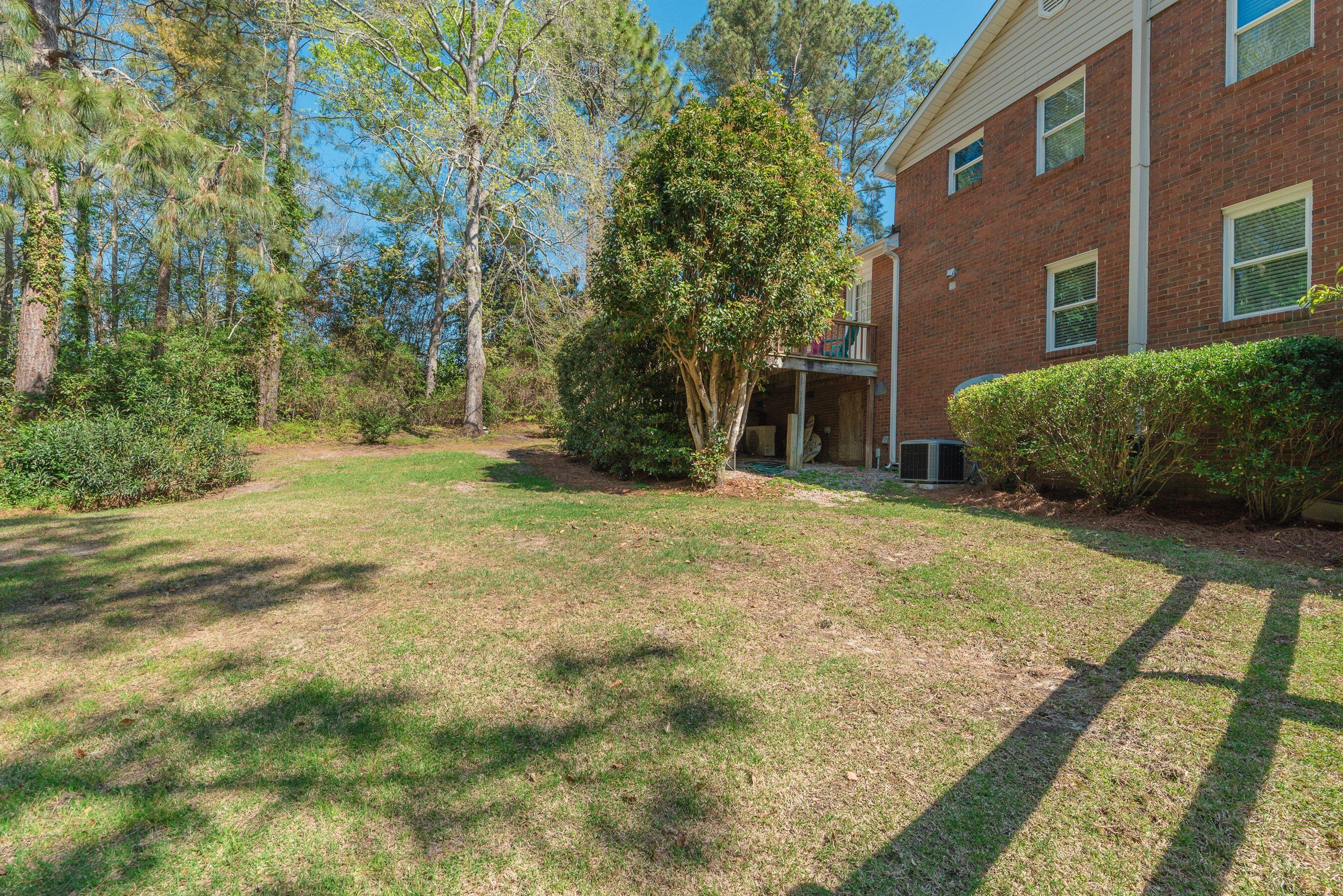 1117 Ridgemont Drive Aiken, SC 29803 - Photo 39 of 49 a view of a yard with plants and trees