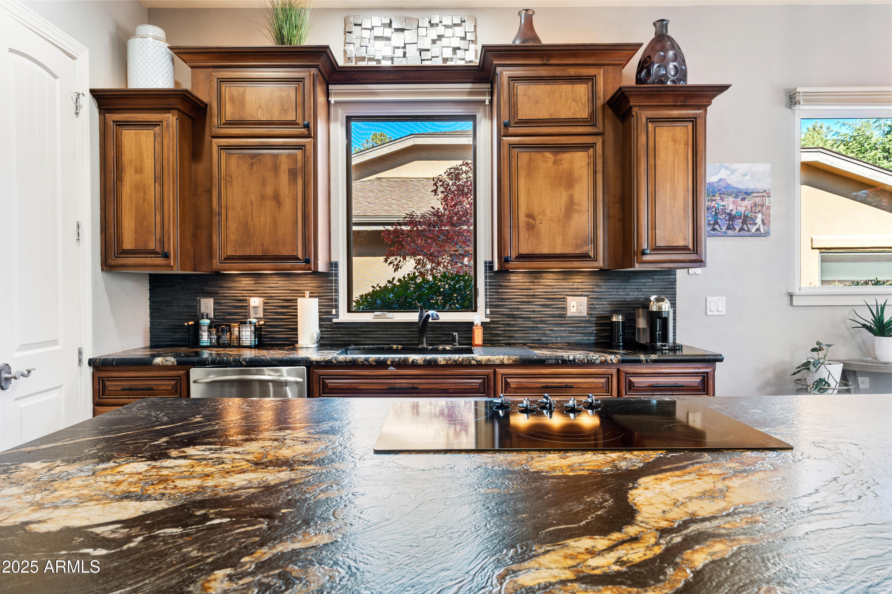 1672 Stable Rock Road Prescott, AZ 86303 - Photo 14 of 47 a kitchen with stainless steel appliances granite countertop a stove and a wooden cabinets