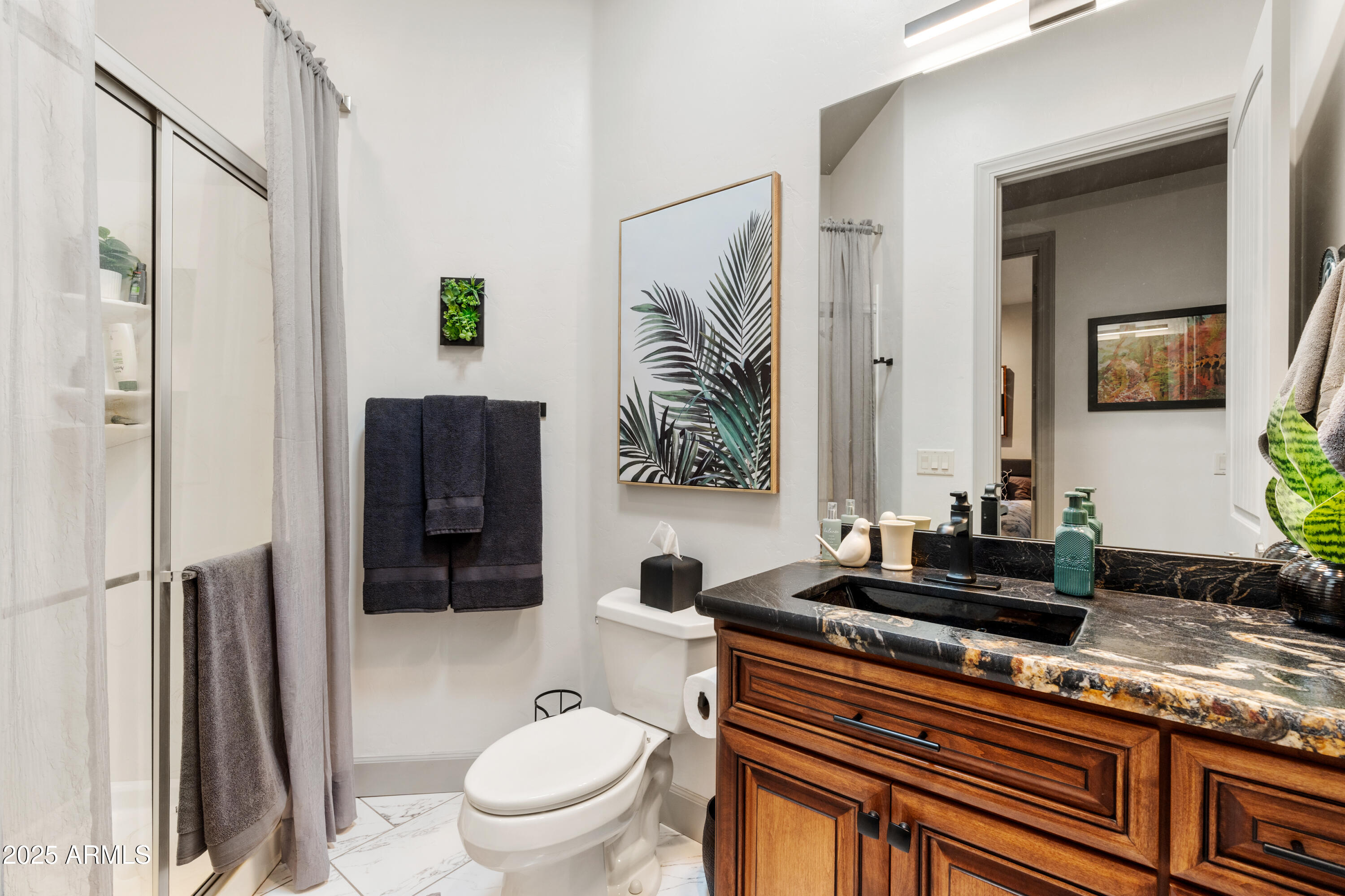 1672 Stable Rock Road Prescott, AZ 86303 - Photo 19 of 47 a bathroom with a granite countertop sink toilet and shower
