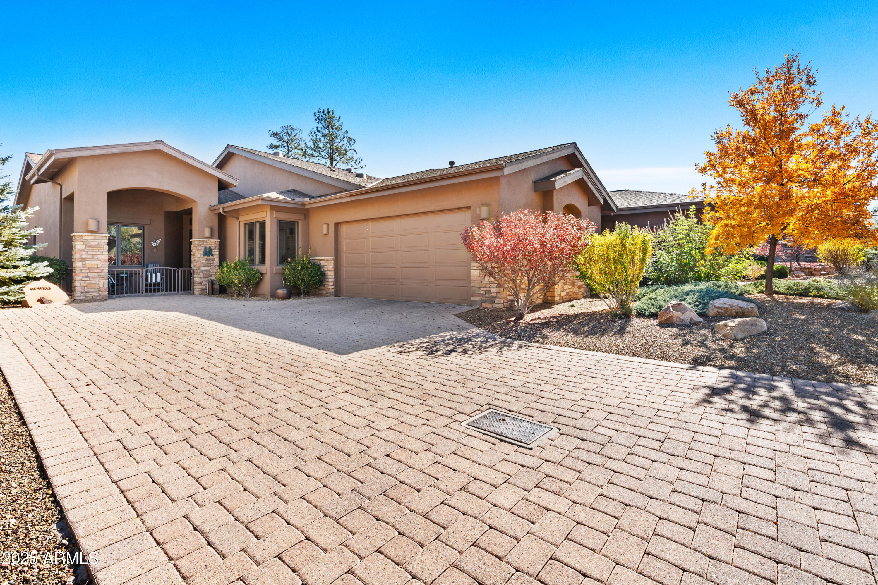 1672 Stable Rock Road Prescott, AZ 86303 - Photo 2 of 47 a front view of a house with a yard and a garage