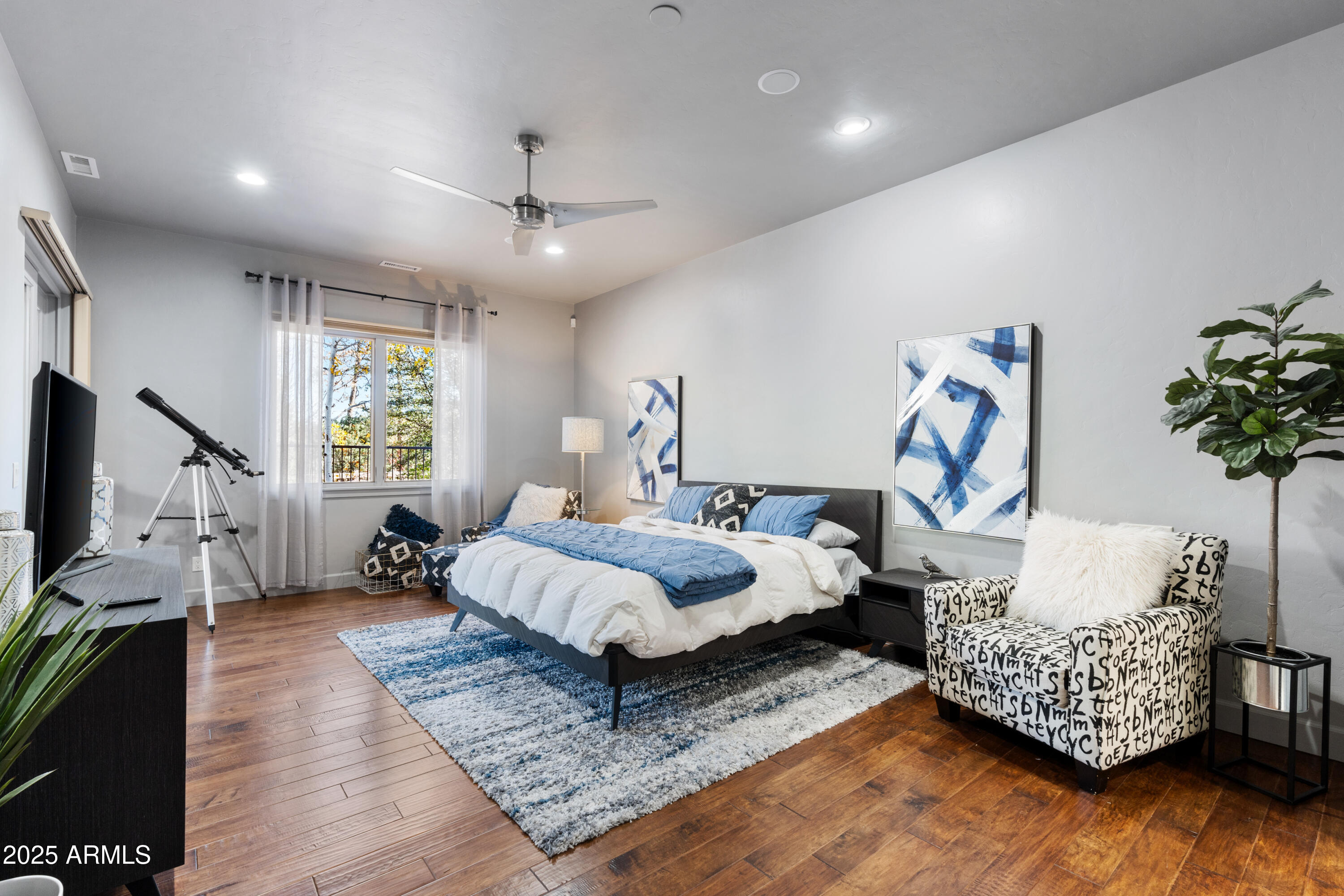 1672 Stable Rock Road Prescott, AZ 86303 - Photo 22 of 47 a bed room with a bed window and a couch