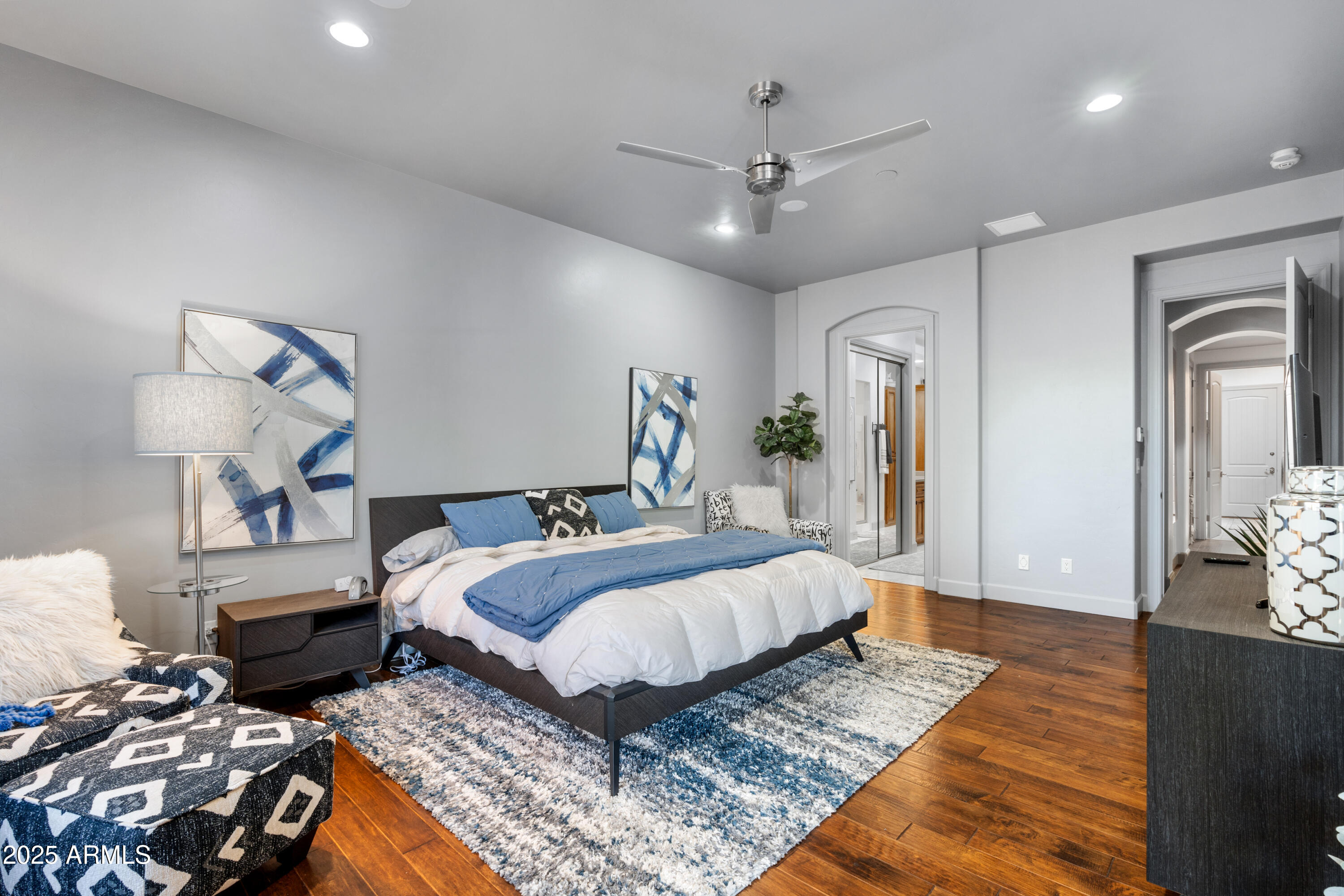 1672 Stable Rock Road Prescott, AZ 86303 - Photo 24 of 47 a bedroom with bed and a chandelier