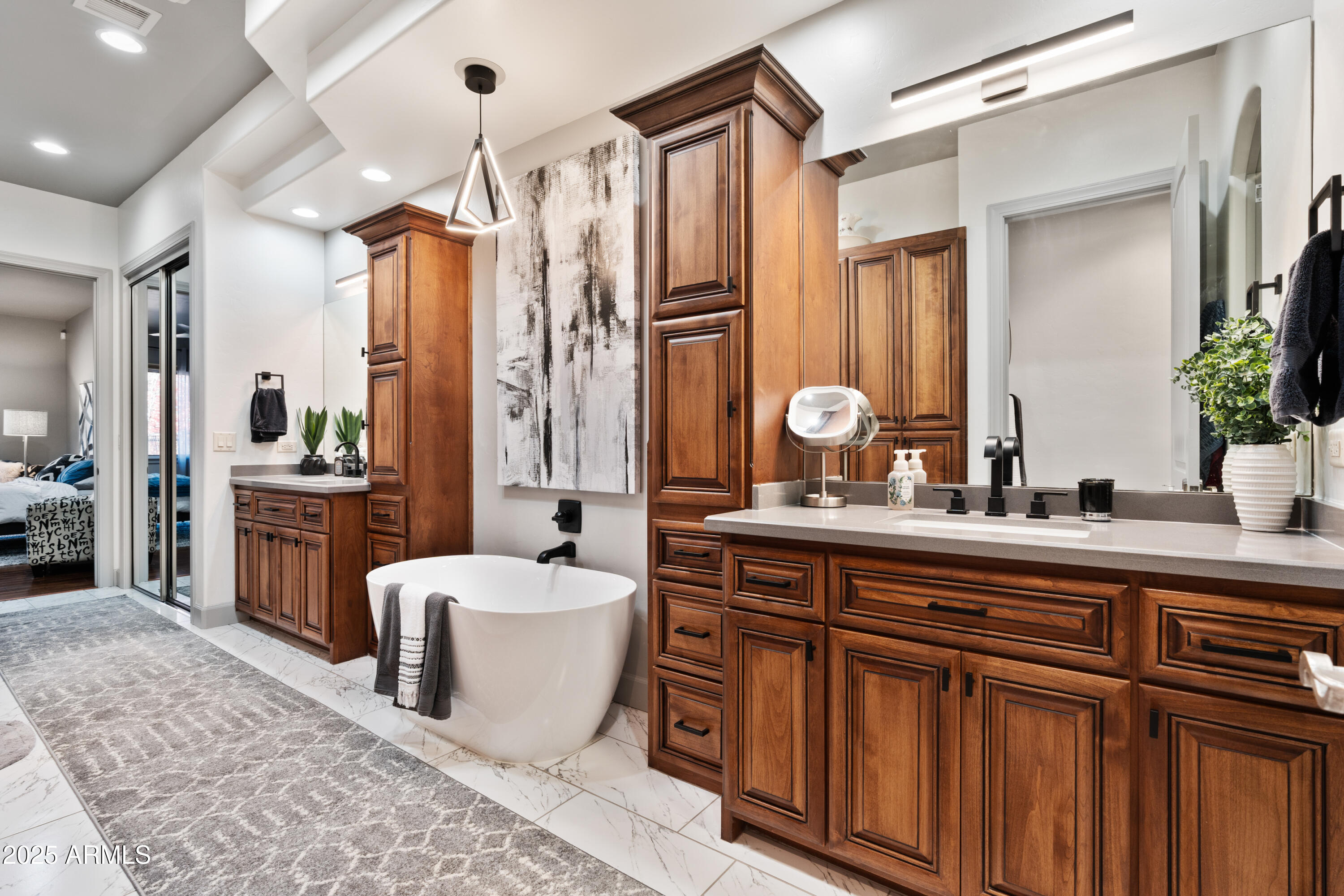 1672 Stable Rock Road Prescott, AZ 86303 - Photo 26 of 47 a spacious bathroom with a double vanity sink a mirror a bathtub and a shower