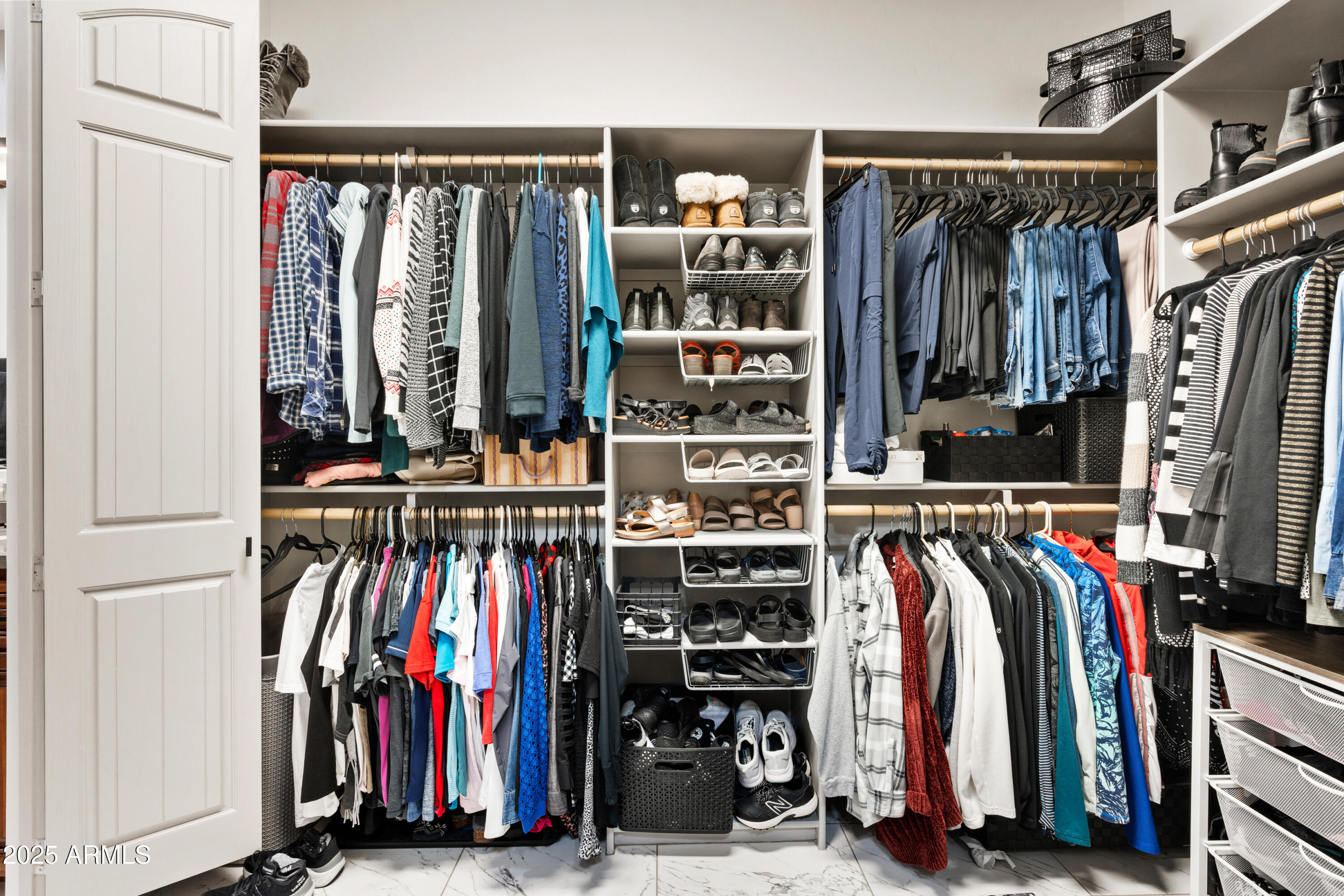 1672 Stable Rock Road Prescott, AZ 86303 - Photo 29 of 47 a view of walk in closet with clothes and shoes