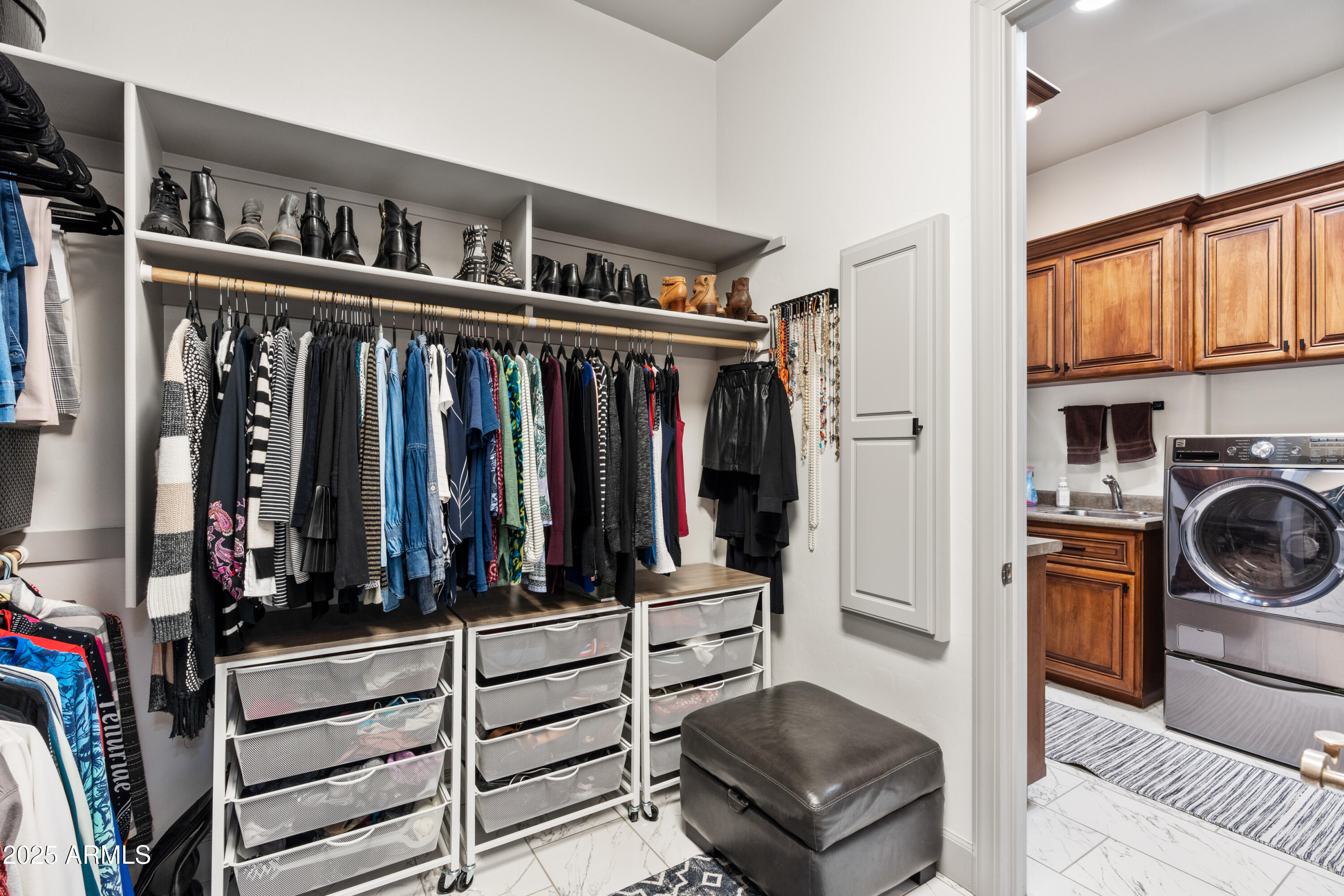 1672 Stable Rock Road Prescott, AZ 86303 - Photo 30 of 47 a view of walk in closet with clothes and shoes