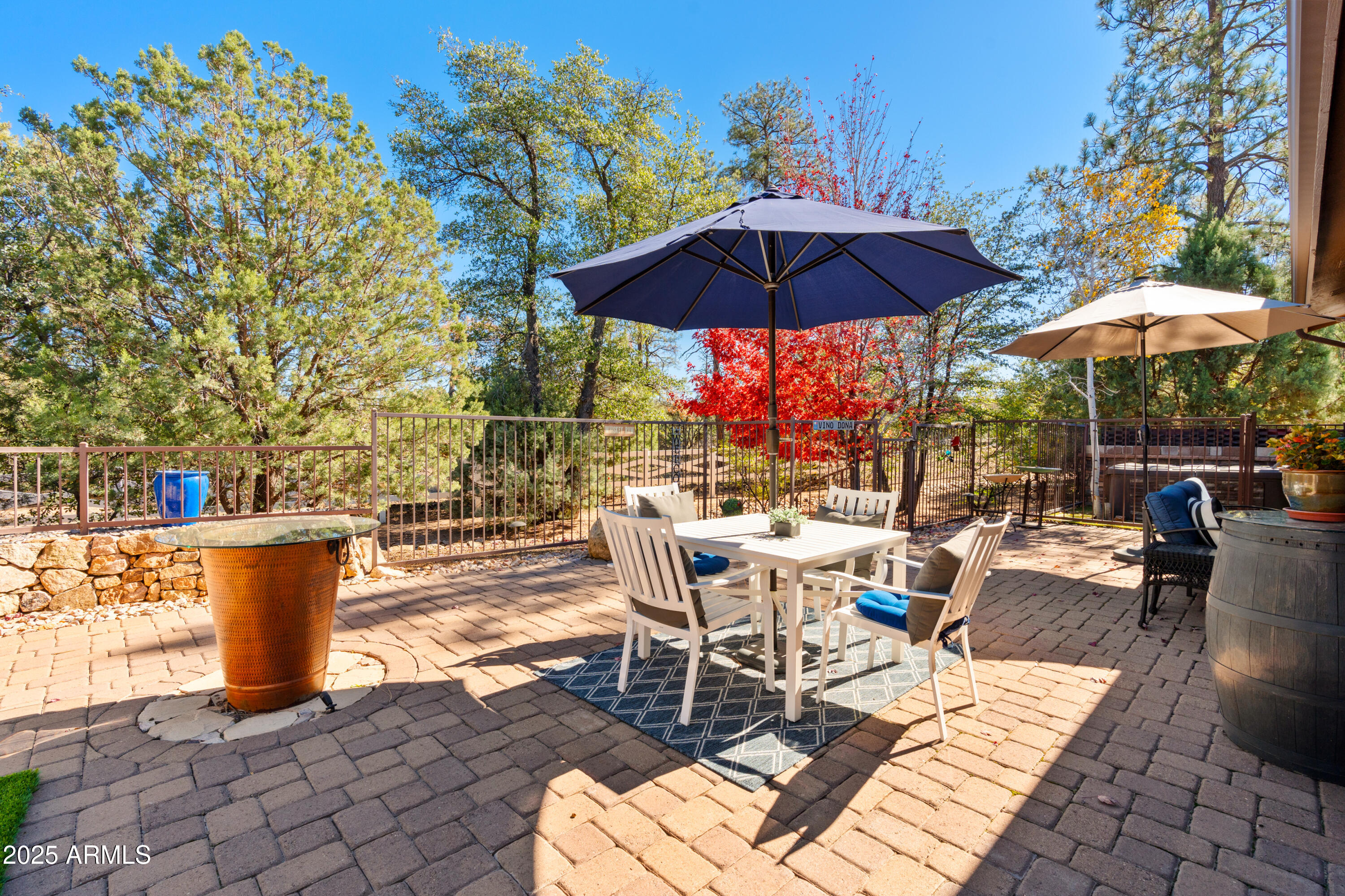 1672 Stable Rock Road Prescott, AZ 86303 - Photo 38 of 47 a view of a tables and chairs under an umbrella