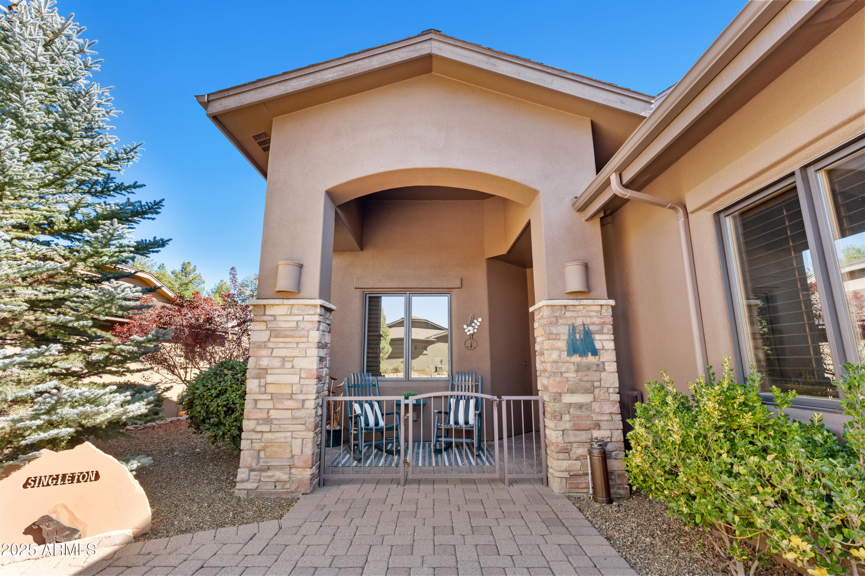 1672 Stable Rock Road Prescott, AZ 86303 - Photo 4 of 47 a front view of a house with garden