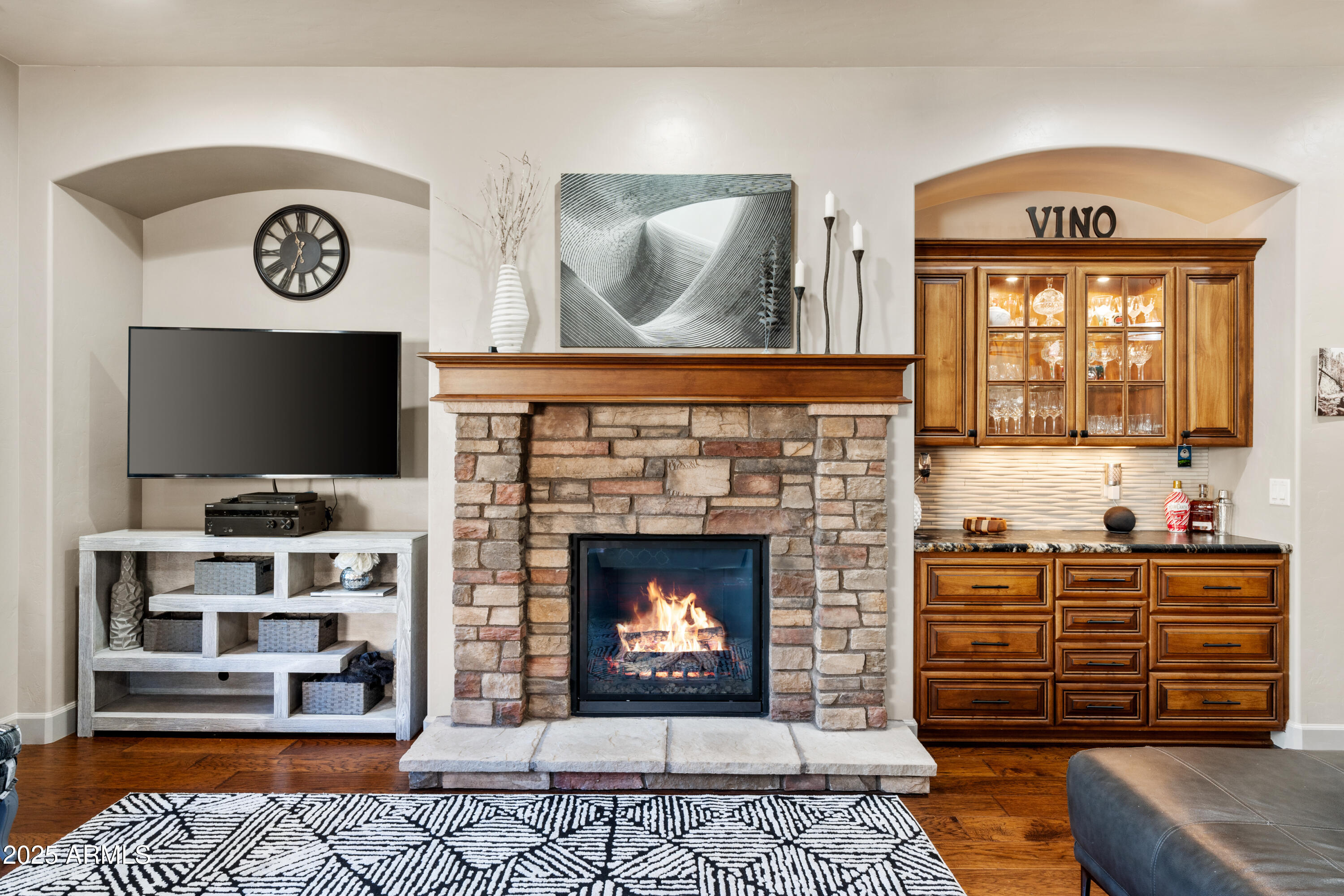1672 Stable Rock Road Prescott, AZ 86303 - Photo 9 of 47 a living room with fireplace and a flat screen tv