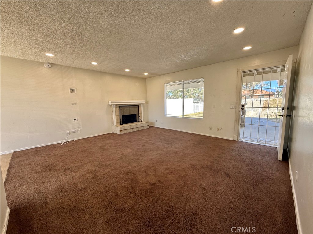 9920 Jurupa Road Jurupa Valley, CA 92509 - Photo 2 of 13 a view of empty room with windows
