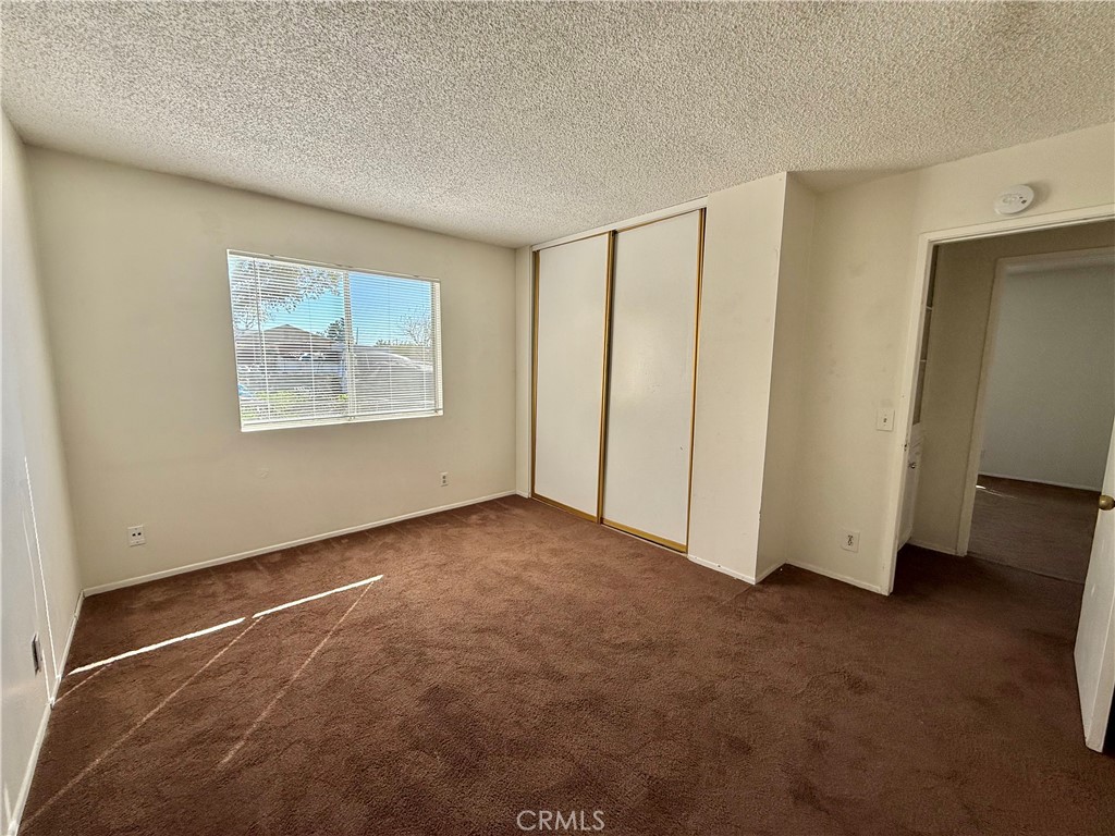 9920 Jurupa Road Jurupa Valley, CA 92509 - Photo 7 of 13 a view of an empty room with a window