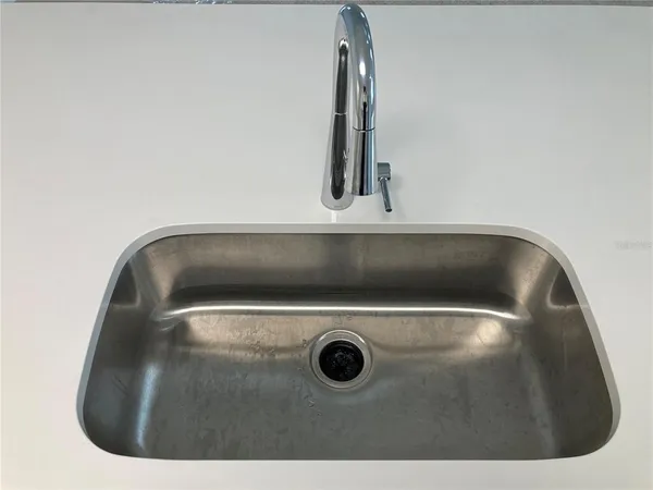 a view of storage and utility room with washer and dryer