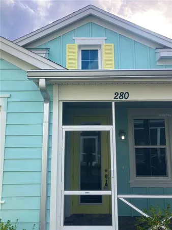 an aerial view of a kitchen with stainless steel appliances kitchen island granite countertop a refrigerator and a stove