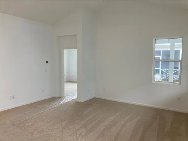 a bathroom with a granite countertop toilet a sink and bathtub