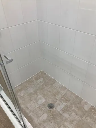 a view of swimming pool with patio