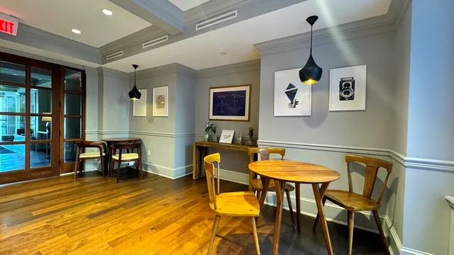 a view of a patio with furniture and potted plants