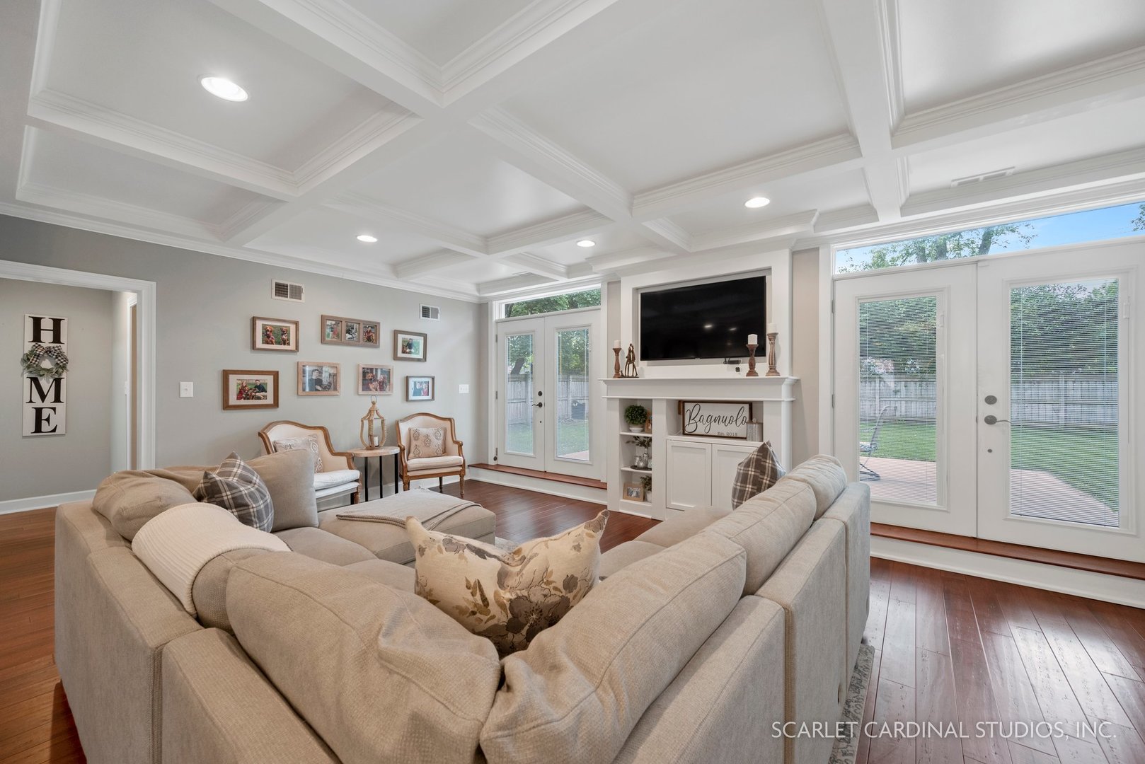 432 Countryside Drive Wheaton, IL 60187 - Photo 11 of 29 a living room with furniture a flat screen tv and a large window