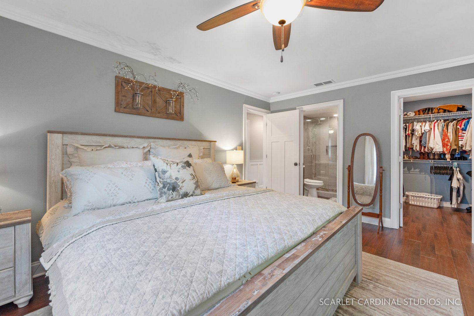 432 Countryside Drive Wheaton, IL 60187 - Photo 13 of 29 a bedroom with a large bed and a chandelier