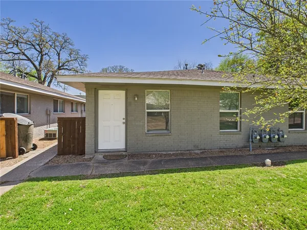 a front view of house with yard