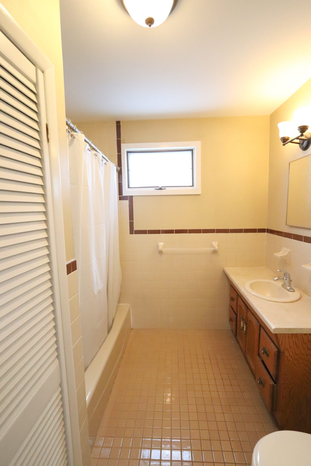 72 North Whittlesey Avenue, Unit 1 Wallingford, CT 06492 - Photo 11 of 11 a bathroom with a sink a toilet and shower