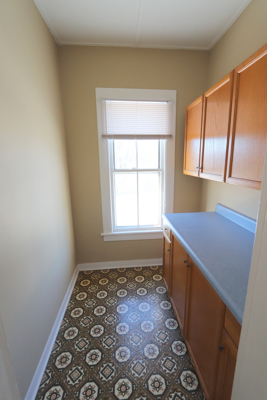 72 North Whittlesey Avenue, Unit 1 Wallingford, CT 06492 - Photo 4 of 11 a bathroom with a sink a toilet and window