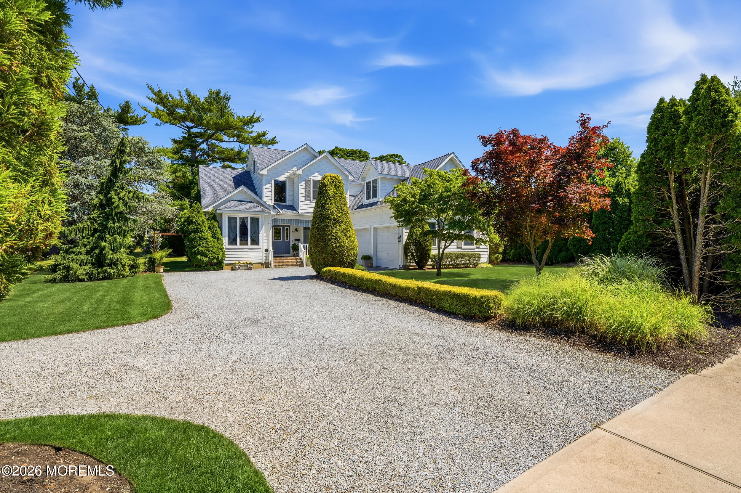 478 Rickey Lane Long Branch, NJ 07740 - Photo 16 of 64 a view of a house with a yard and potted plants